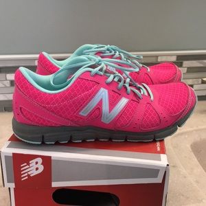New Balance tennis shoes.